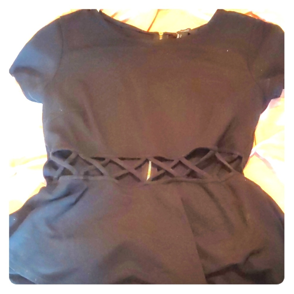 Black peekaboo blouse.